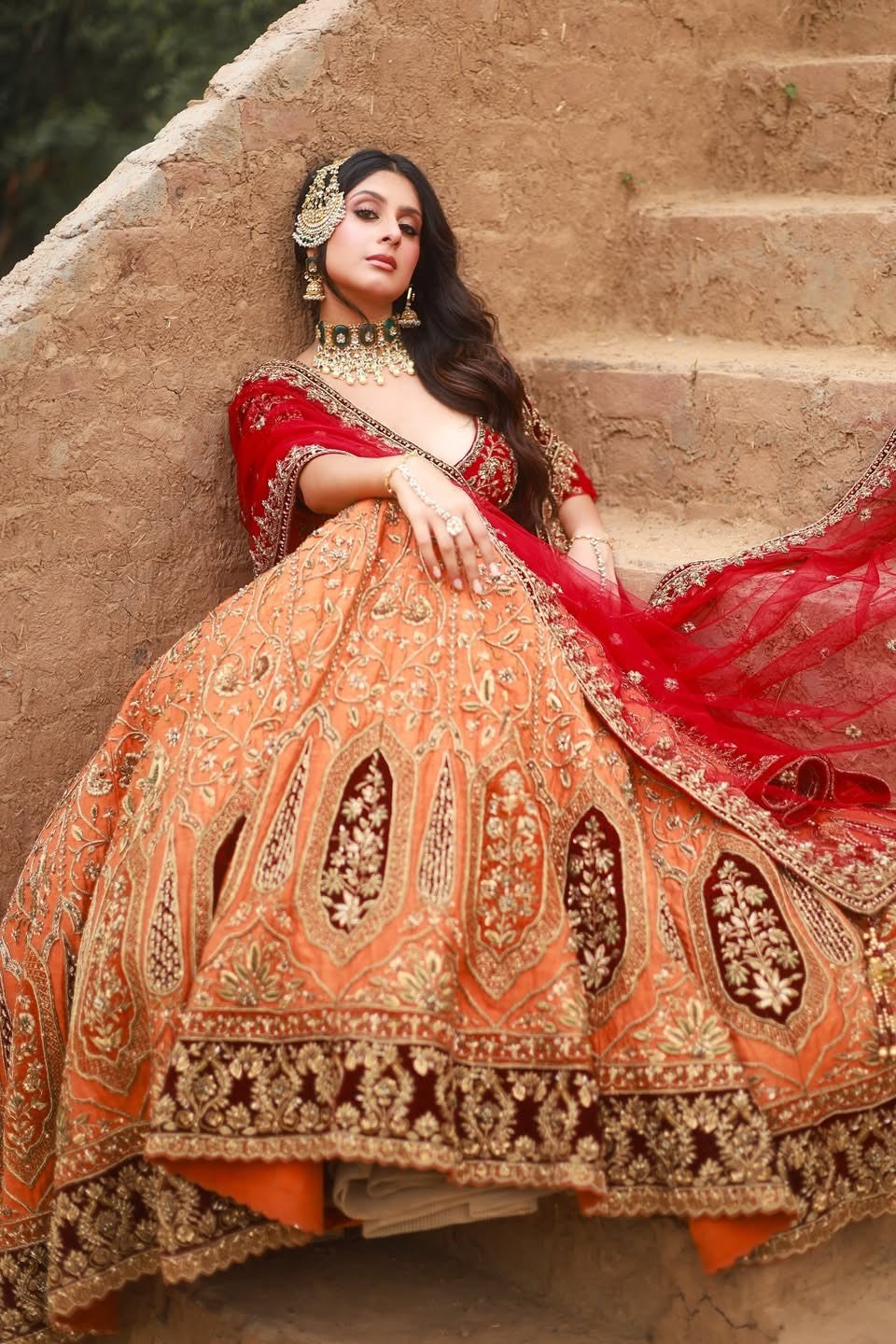 Isha Malviya Draped in Aliyana’s Luxe Vibrant Orange Bridal Lehenga